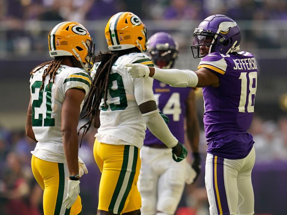 Justin Jefferson celebrates a first down against the Green Bay Packers.