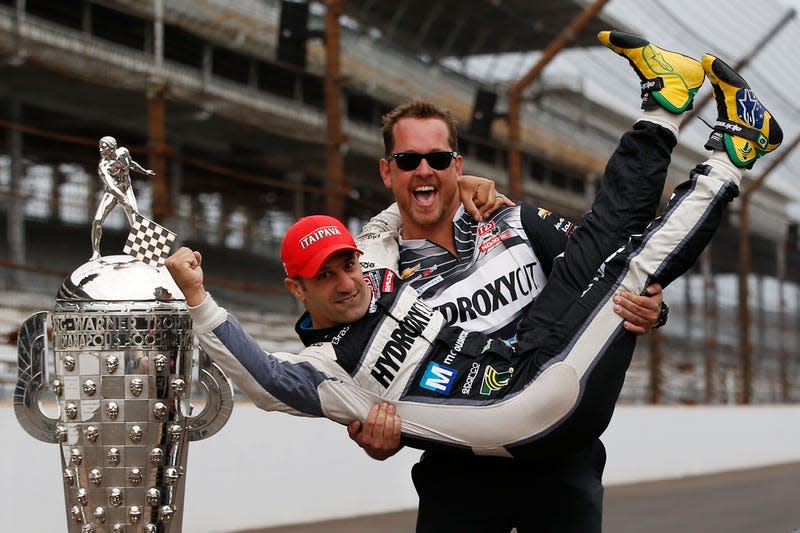 Tony Kanaan after his 2013 Indy 500 win with crewmember Kyle Sagan