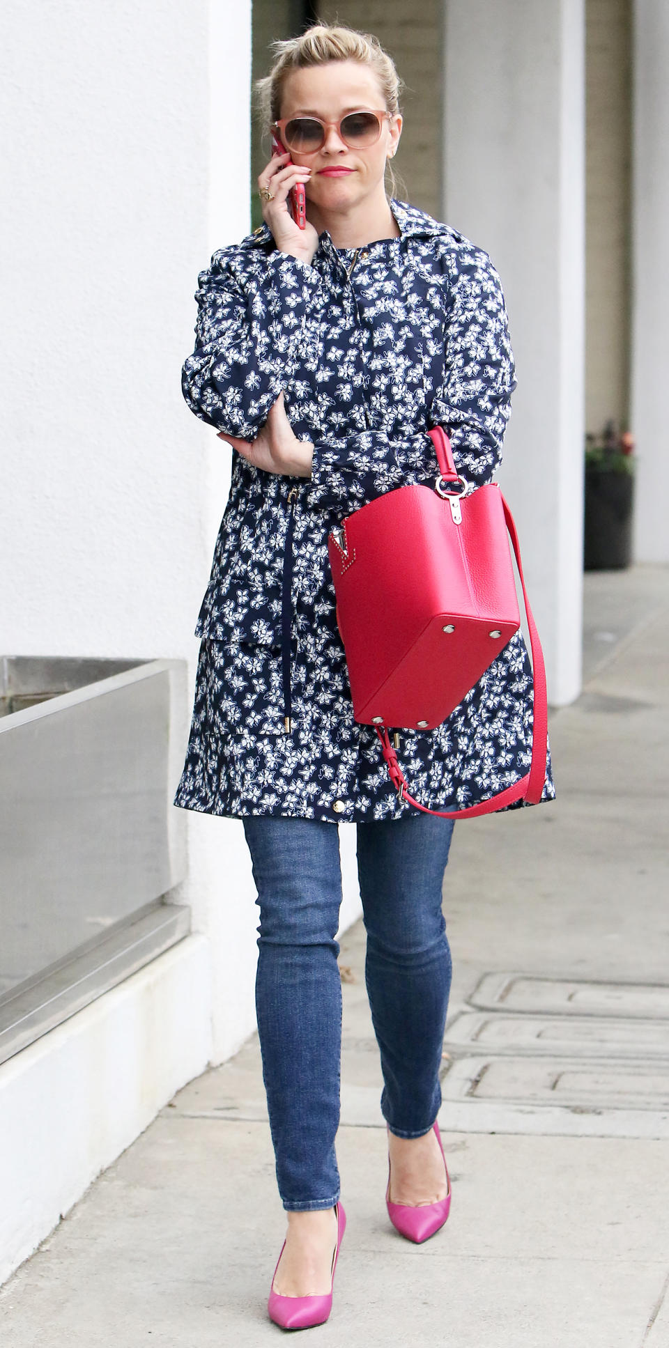 <p>The actress was spotted out in Los Angeles rocking the chicest floral rain jacket we've ever seen. She accessorized her outfit with equally sweet accessories, including oversize sunnies, a vibrant handbag, and pink pumps.</p>