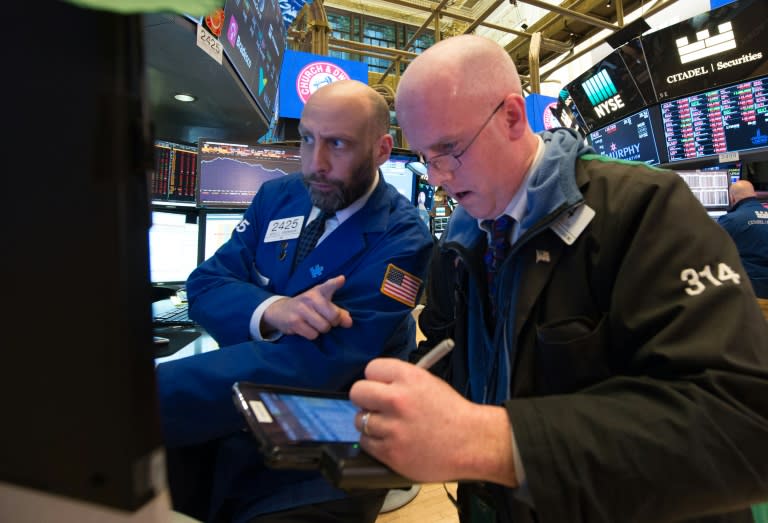 Traders on the floor at the closing bell of the Dow Industrial Average at the New York Stock Exchange on February 5, 2018