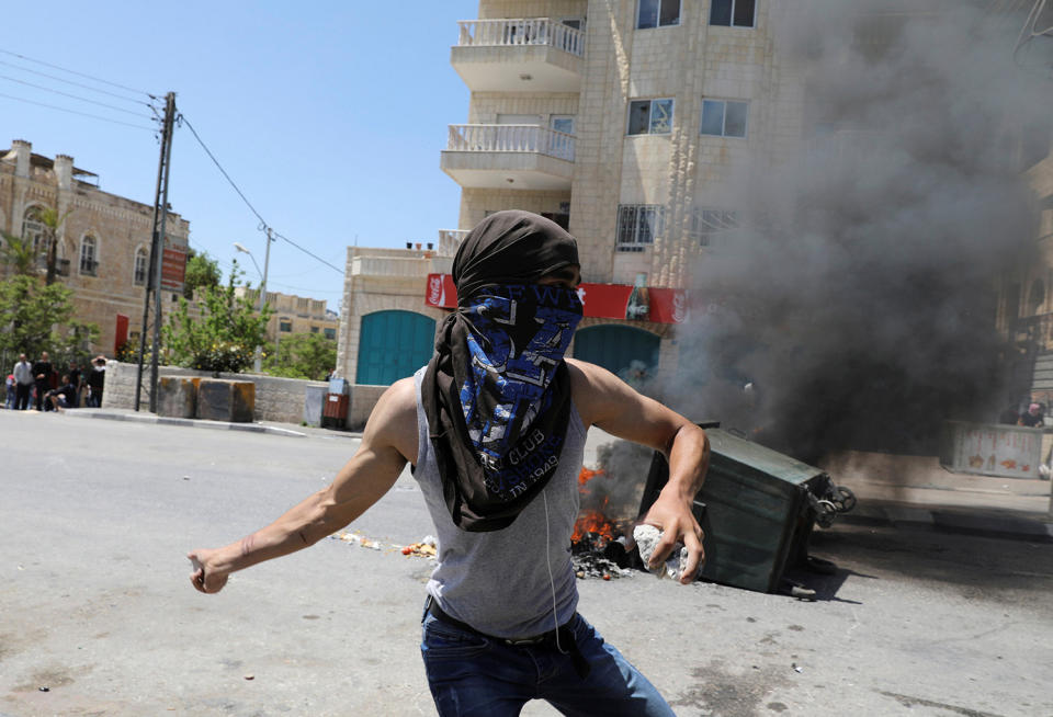 Palestinian protester hurls stones towards Israeli troops in Bethlehem