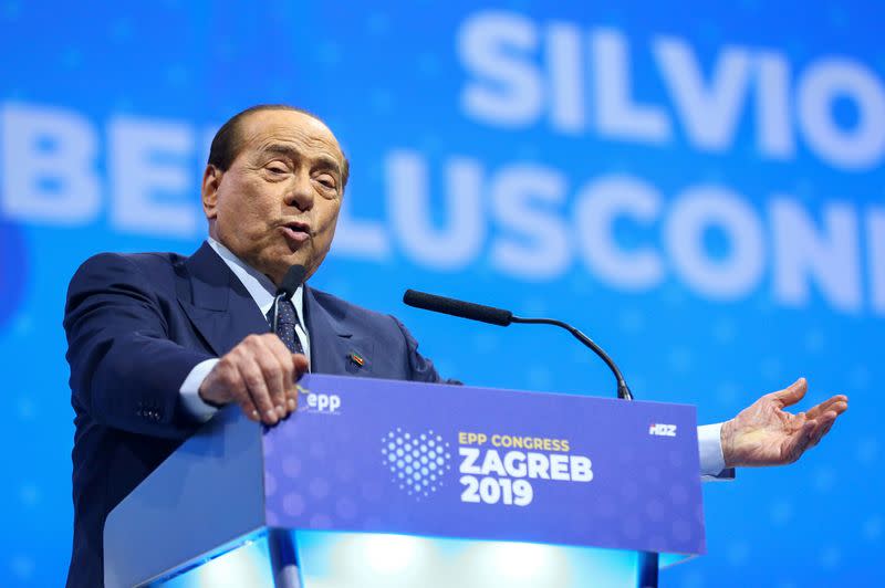 FILE PHOTO: Italian politician Silvio Berlusconi speaks during the EPP congress in Arena Zagreb hall in Zagreb