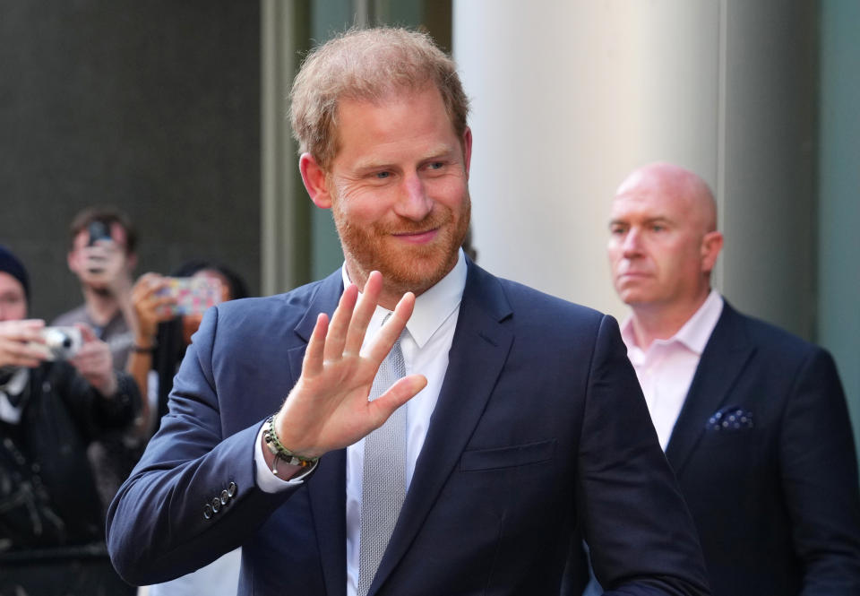 LONDON, ENGLAND - JUNE 7: Prince Harry, Duke of Sussex, waves as he leaves after giving evidence at the Mirror Group Phone hacking trial at the Rolls Building at High Court on June 7, 2023 in London, England. Prince Harry is one of several claimants in a lawsuit against Mirror Group Newspapers related to allegations of unlawful information gathering in previous decades. (Photo by Carl Court/Getty Images)