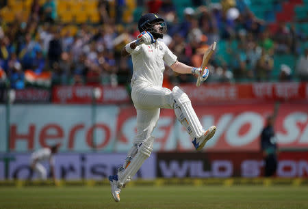 Cricket - India v Australia - Fourth Test cricket match - Himachal Pradesh Cricket Association Stadium, Dharamsala, India - 28/03/17 - India's Lokesh Rahul celebrates after winning the match. REUTERS/Adnan Abidi