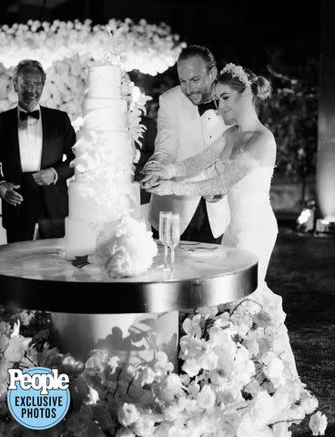 <p>Joel Serrato</p> Brendan Fitzpatrick and Chloe de Serigny cut their wedding cake