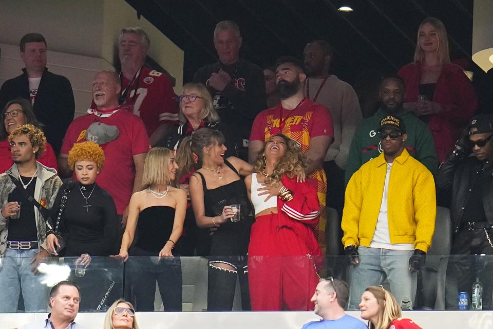 Taylor Swift, bottom left, and Blake Lively laugh before the NFL Super Bowl 58 football game between the San Francisco 49ers and the Kansas City Chiefs on Sunday, Feb. 11, 2024, in Las Vegas. (AP Photo/Julio Cortez)