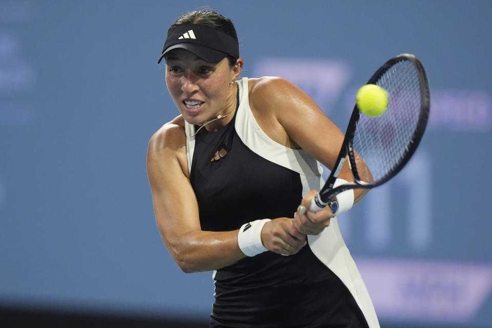 Jessica Pegula, of the United States, hits a return to Ekaterina Alexandrova, of Russia, during the Miami Open tennis tournament Wednesday, March 27, 2024, in Miami Gardens, Fla. (AP Photo/Marta Lavandier)