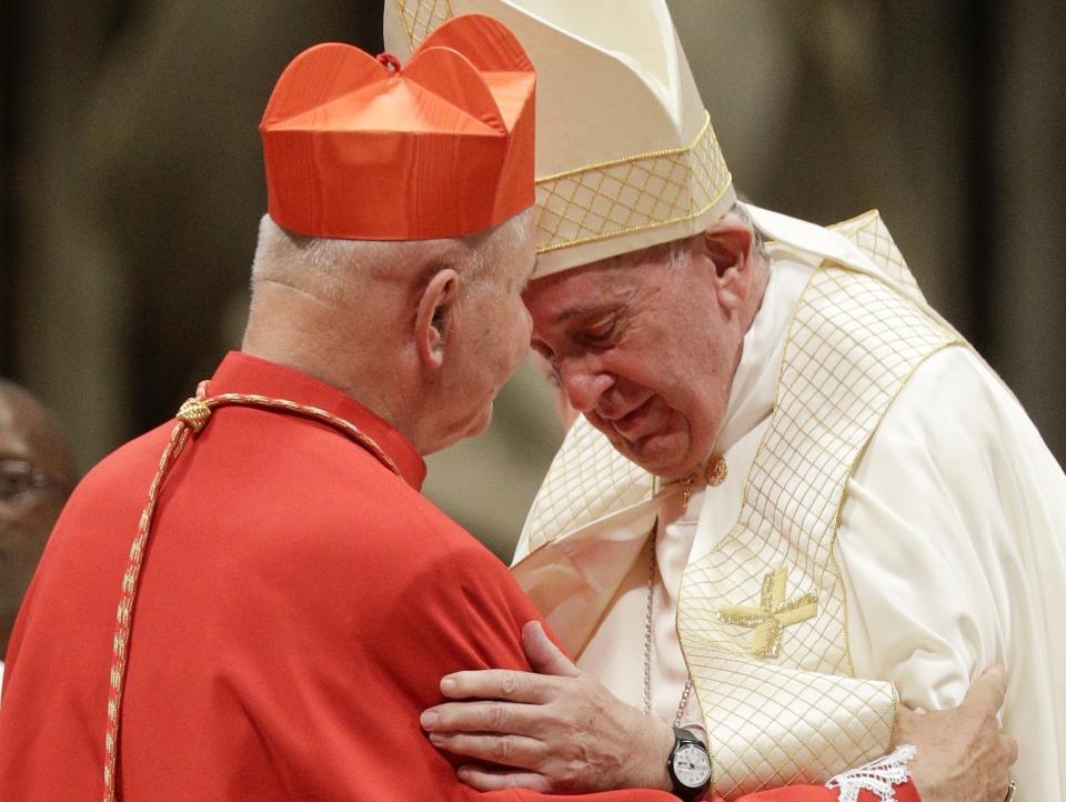 Pope Francis is moved as he greets Cardinal Sigitas Tamkevicius during a consistory inside St. Peter's Basilica, at the Vatican, Saturday, Oct. 5, 2019. Pope Francis has chosen 13 men he admires and whose sympathies align with his to become the Catholic Church's newest cardinals. (AP Photo/Andrew Medichini)