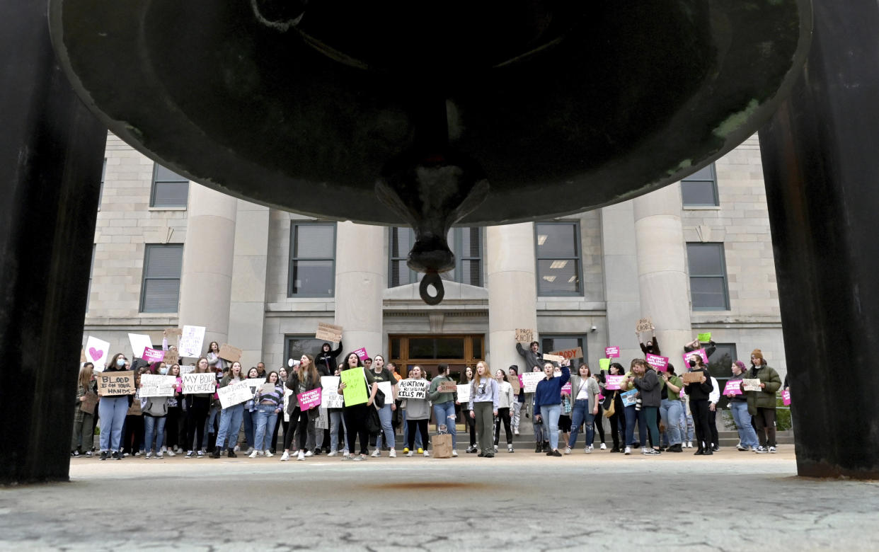 People gather for an abortion rights rally outside the Boone County Courthouse in Columbia, Mo., on Tuesday. (Maya Bell, Columbia Missourian/AP Photo)