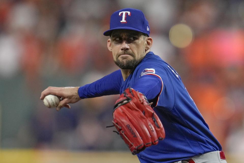 Texas Rangers starting pitcher Nathan Eovaldi thorws during the first inning of Game 6 of the baseball AL Championship Series against the Houston Astros Sunday, Oct. 22, 2023, in Houston. (AP Photo/Godofredo A. Vásquez)