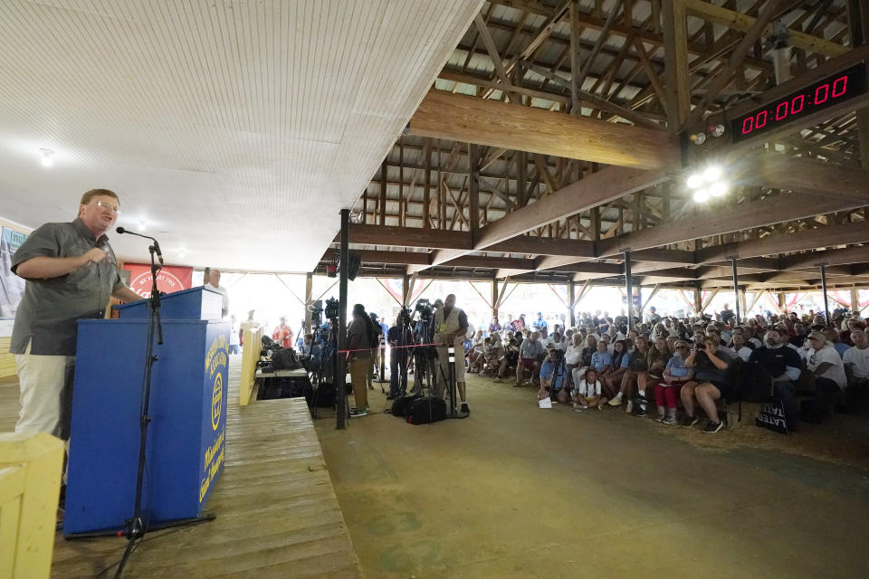 Mississippi Republican Gov. Tate Reeves, the final speaker for the day, went over the 10-minute speaking limit while addressing the crowd at the Neshoba County Fair in Philadelphia, Miss., Thursday, July 27, 2023. Reeves faces two opponents in the party primary on Aug. 8, as he seeks reelection. (AP Photo/Rogelio V. Solis)