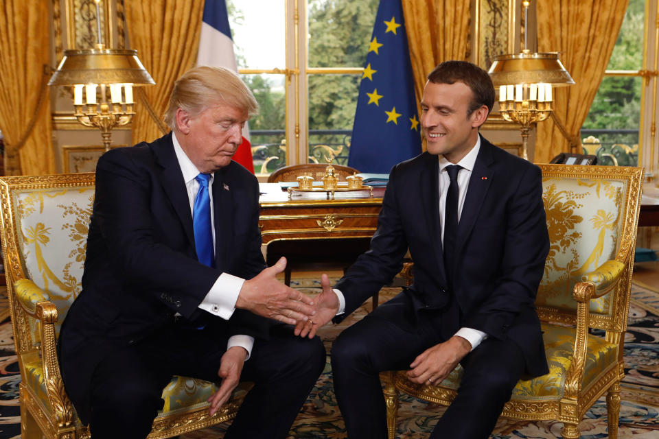 <p>French President Emmanuel Macron and President Donald Trump, left, shake hands as they meet at the Elysee Palace in Paris, France, Thursday, July 13, 2017. (Photo: Kevin Lamarque/Pool Photo via AP) </p>