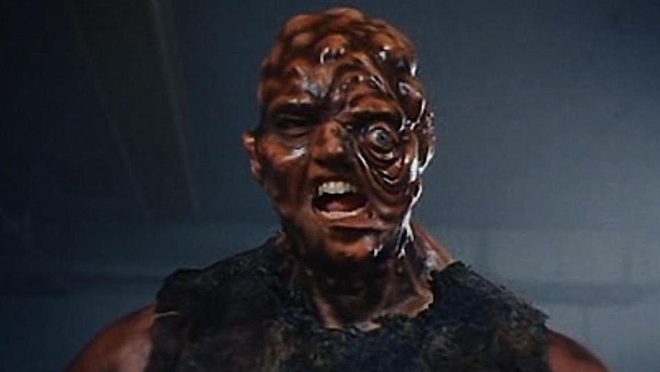 A close-up on the melting face of the Toxic Avenger