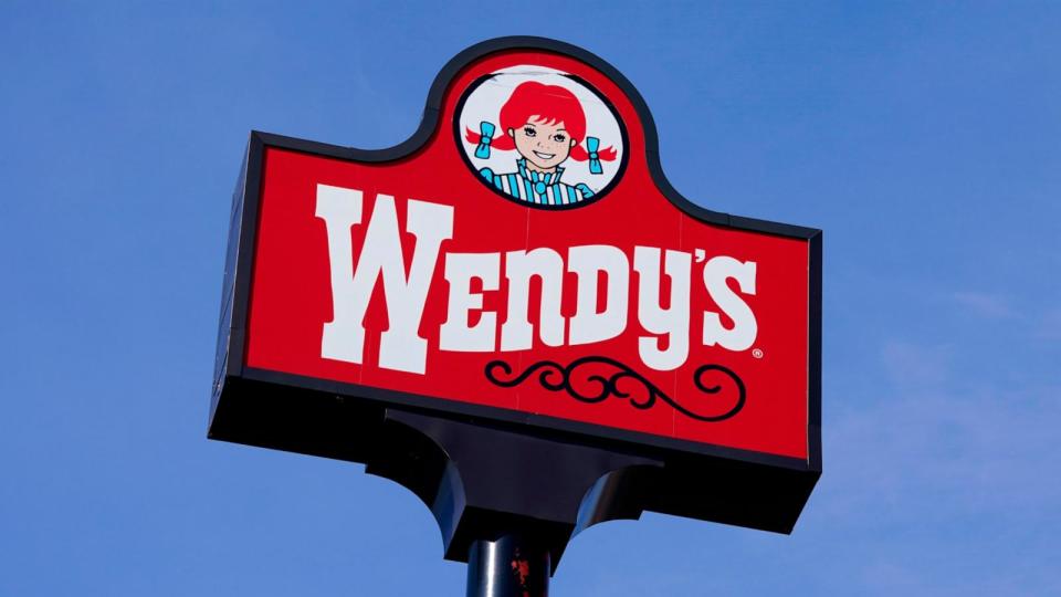 PHOTO: A sign stands over a Wendy's restaurant, Feb. 25, 2021, in Des Moines, Iowa.  (Charlie Neibergall/AP)