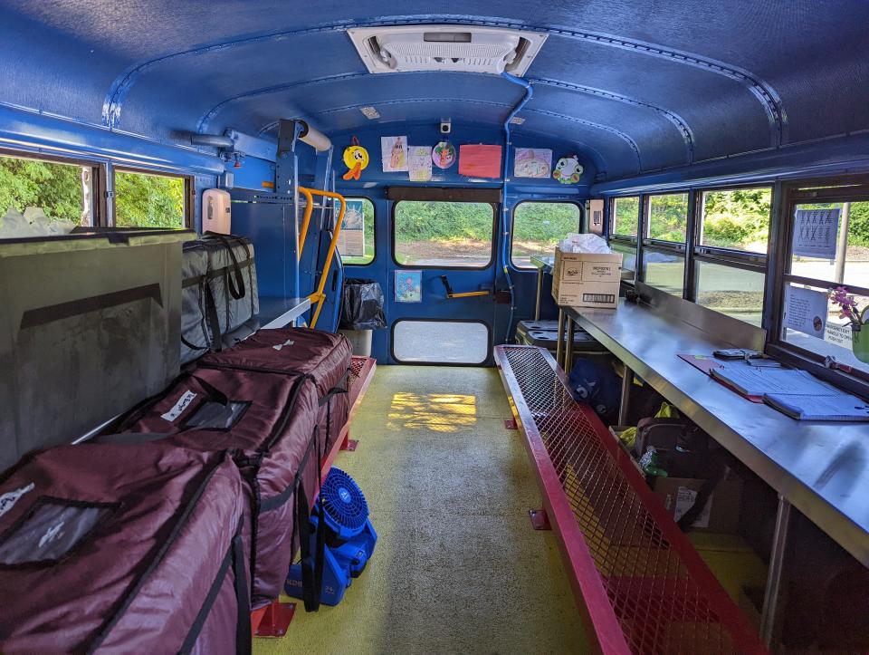 The inside of a "Meals On the Bus" bus. Before the COVID-19 pandemic, children had to eat their meals on the bus, however, due to a waver from the USDA, parents or children can take meals to go.