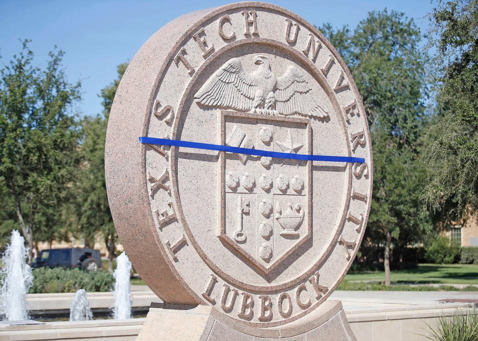 Blue tape is stretched across the Texas Tech University Seal to honor Floyd East Jr., a Tech police officer, after he was shot and killed by Hollis Daniels on Oct. 10, 2017, in Lubbock, Texas. (Brad Tollefson/A-J Media)