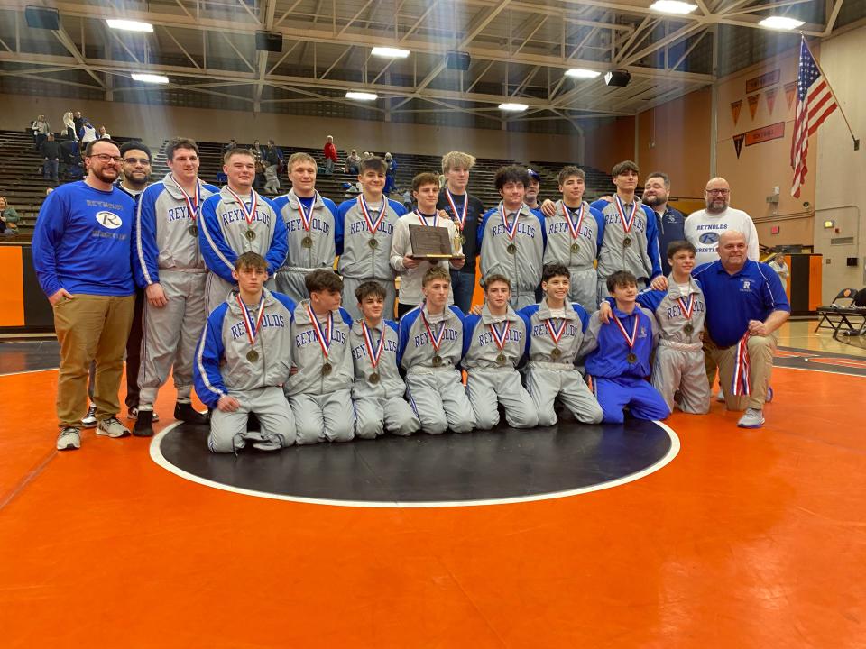 The Reynolds wrestling team successfully defended its District 10 Class 2A team wrestling championship by beating Fort LeBoeuf, 33-27, Saturday at Sharon High School. Reynolds beat Sharpsville in the quarterfinals and General McLane in the semis.