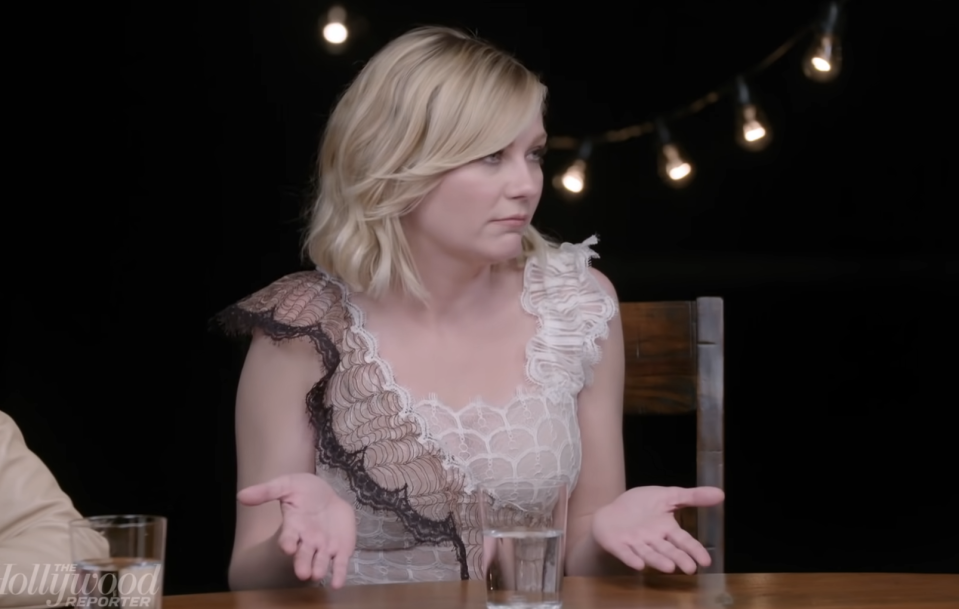 Close-up of Kirsten seated at a table