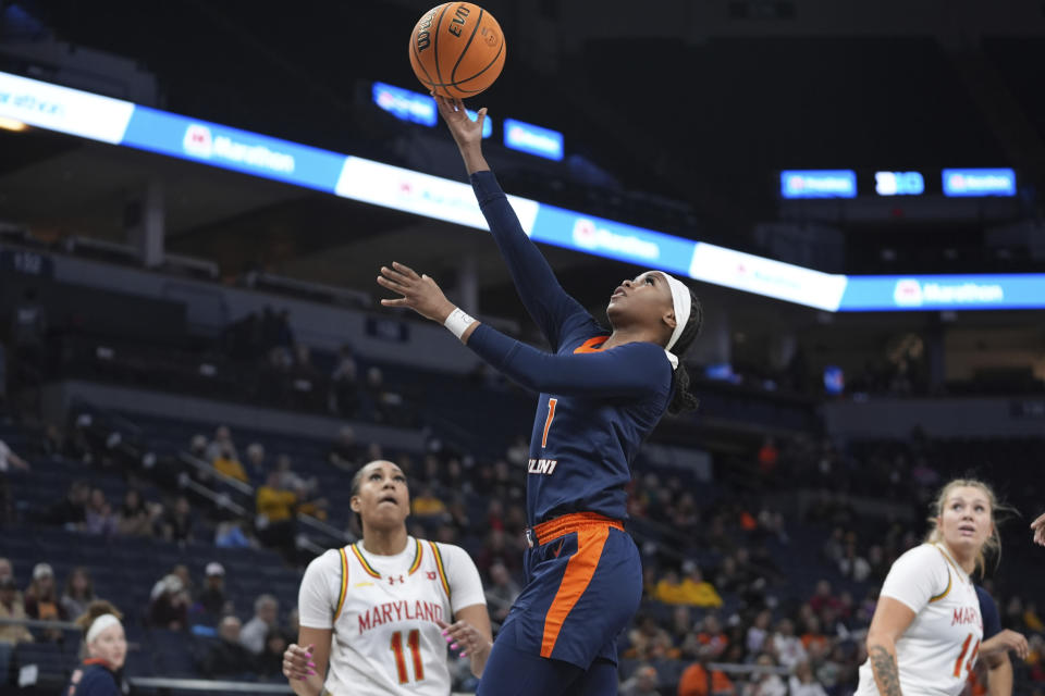 Illinois guard Genesis Bryant (1) shoots during the first half of an NCAA college basketball game against Maryland at the Big Ten women's tournament Thursday, March 7, 2024, in Minneapolis. (AP Photo/Abbie Parr)