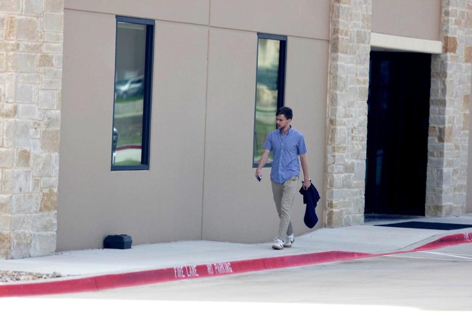 Konner Earnest outside of the offices of Pale Horse Strategies in Fort Worth on Oct. 6, 2023. Earnest is an associate of Nick Fuentes and also worked on former state Sen. Don Huffines' gubernatorial campaign in 2022.