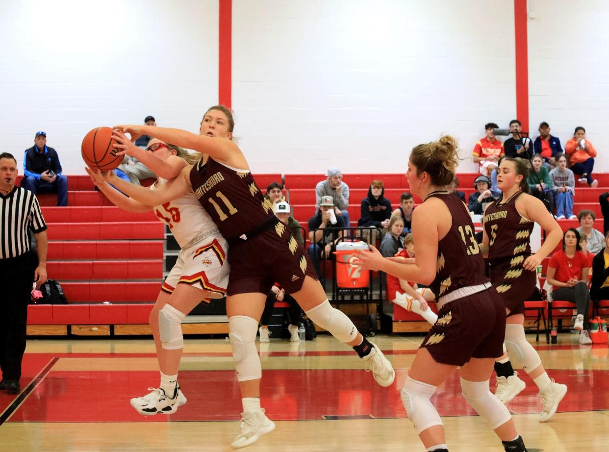 Whitesboro's Olivia Hildebrand battles S&S' Cate Sloan for a rebound during the Lady Bearcats' victory over the Lady Rams in District 10-3A action.