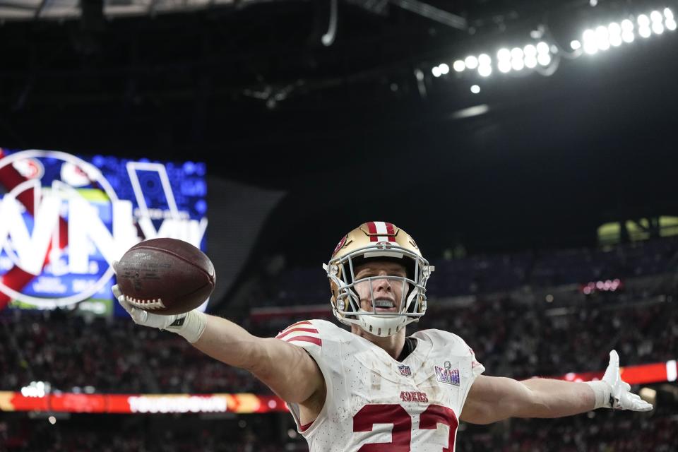 San Francisco 49ers running back Christian McCaffrey (23) celebrates his touchdown against the Kansas City Chiefs during the first half of the NFL Super Bowl 58 football game Sunday, Feb. 11, 2024, in Las Vegas. (AP Photo/George Walker IV)