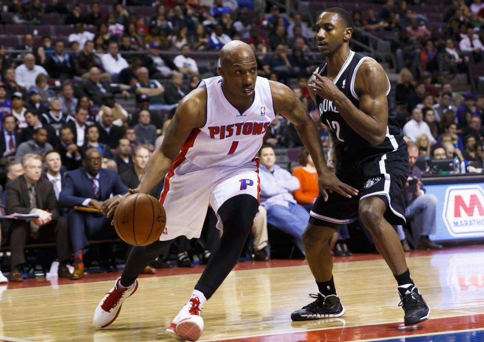 Feb 7, 2014; Auburn Hills, MI, USA; Detroit Pistons shooting guard Chauncey Billups (1) moves the ball defended by Brooklyn Nets point guard Marquis Teague (12) in the second half at The Palace of Auburn Hills. Detroit won 111-95. Mandatory Credit: Rick Osentoski-USA TODAY Sports