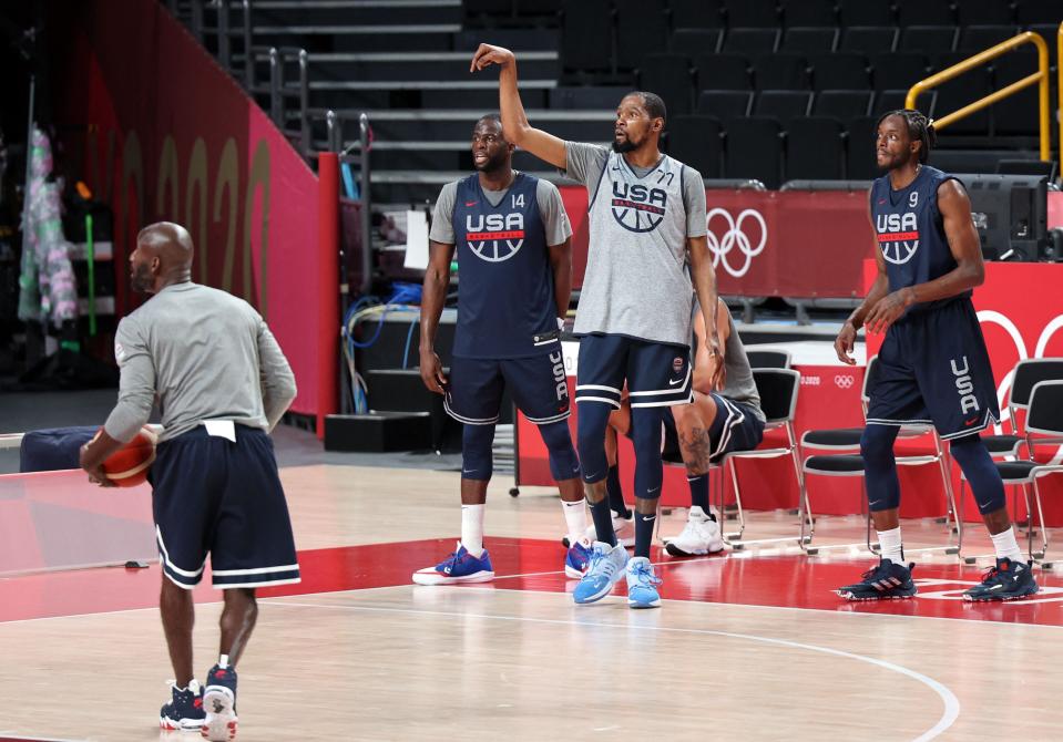 Kevin Durant and Draymond Green and Jeramin Grant practice at the Saitama Super Arena (AFP)