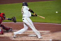 Pittsburgh Pirates' Gregory Polanco hits a three-run home run off St. Louis Cardinals relief pitcher Austin Gomber during the fourth inning of a baseball game in Pittsburgh, Thursday, Sept. 17, 2020. (AP Photo/Gene J. Puskar)