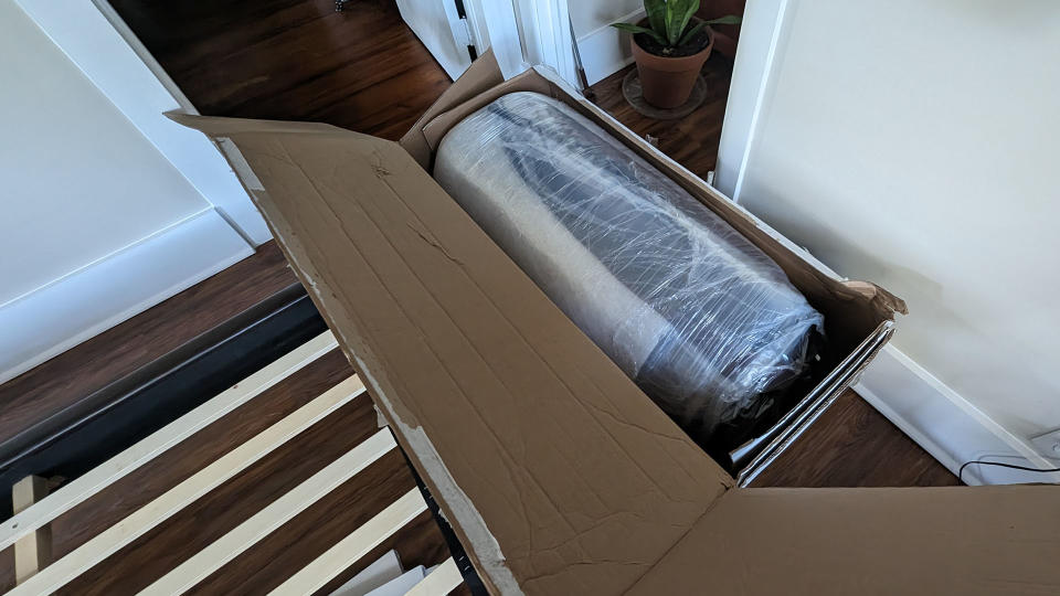 Helix Dusk Luxe mattress rolled and vacuum packed in a box