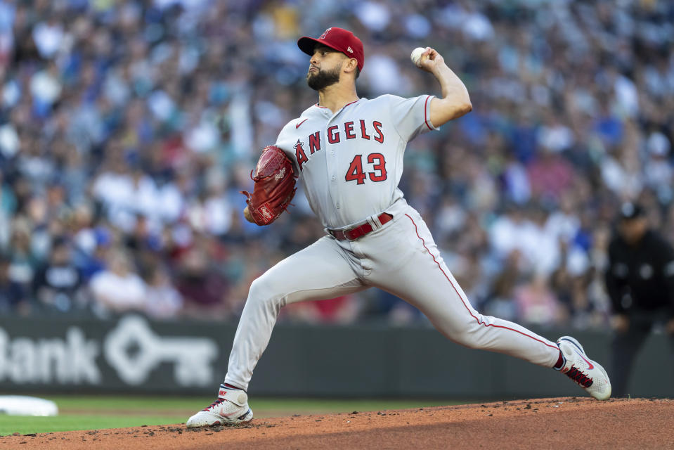 Los Angeles Angels starter Patrick Sandoval throws to a Seattle Mariners batter during the first inning of a baseball game Friday, Aug. 5, 2022, in Seattle. (AP Photo/Stephen Brashear)