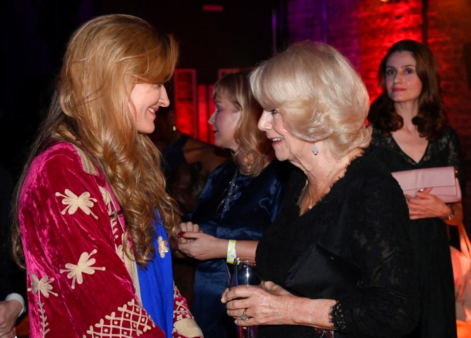 Britain's Camilla, Queen Consort,  meets actor Natascha McElhon during the Booker Prize at the Roundhouse in London, Monday Oct. 17, 2022.  (Toby Melville/Pool Photo via AP)