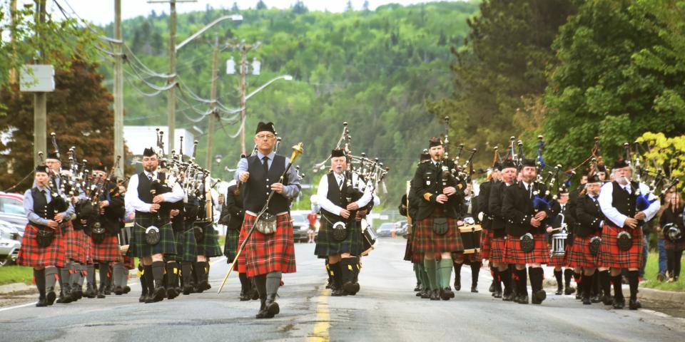 Pipe bands parade through Perth-Andover during the Gathering of the Scots Festival, which returns this year from June 6 to 9.