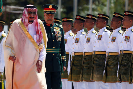 Saudi Arabia's King Salman inspects an honour guard at the Parliament House in Kuala Lumpur, Malaysia February 26, 2017. REUTERS/Edgar Su