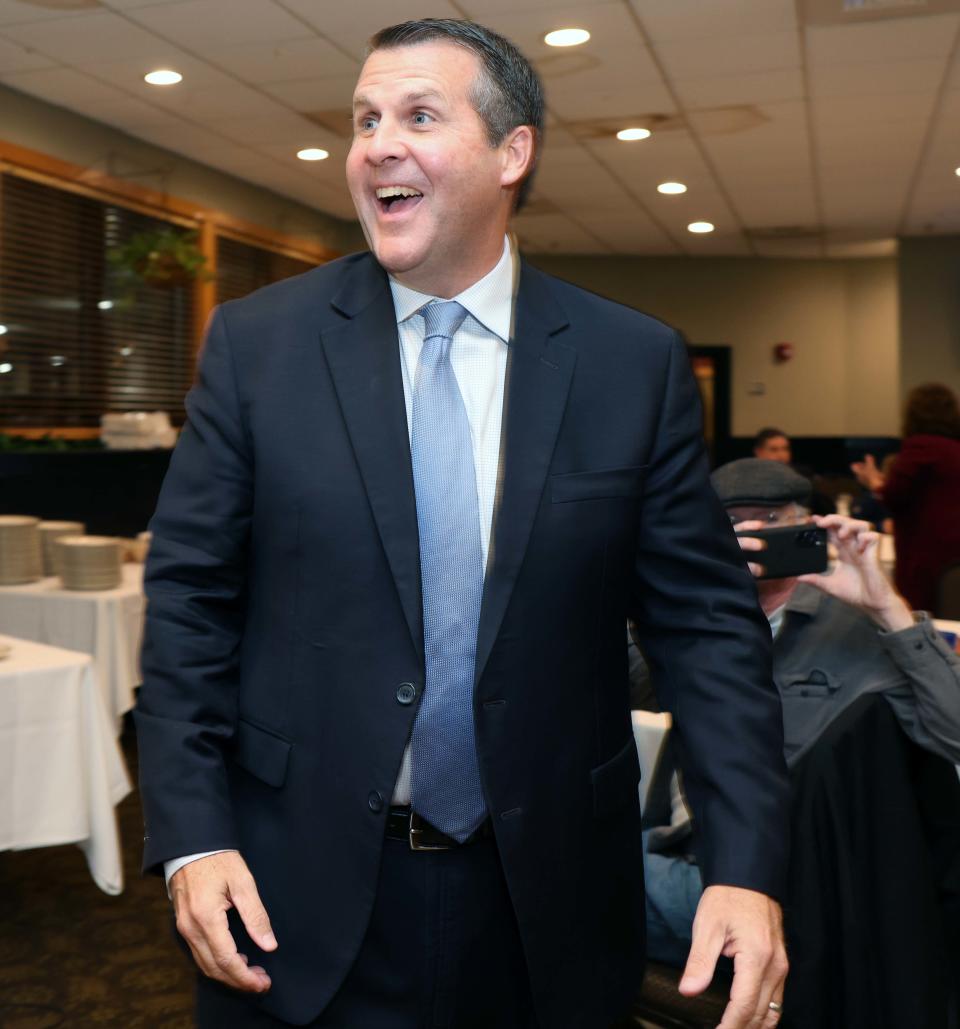 Mayor Robert Sullivan smiles while surrounded by supporters at Tommy Doyle's at Sidelines after he was reelected on Tuesday, Nov. 8, 2023.