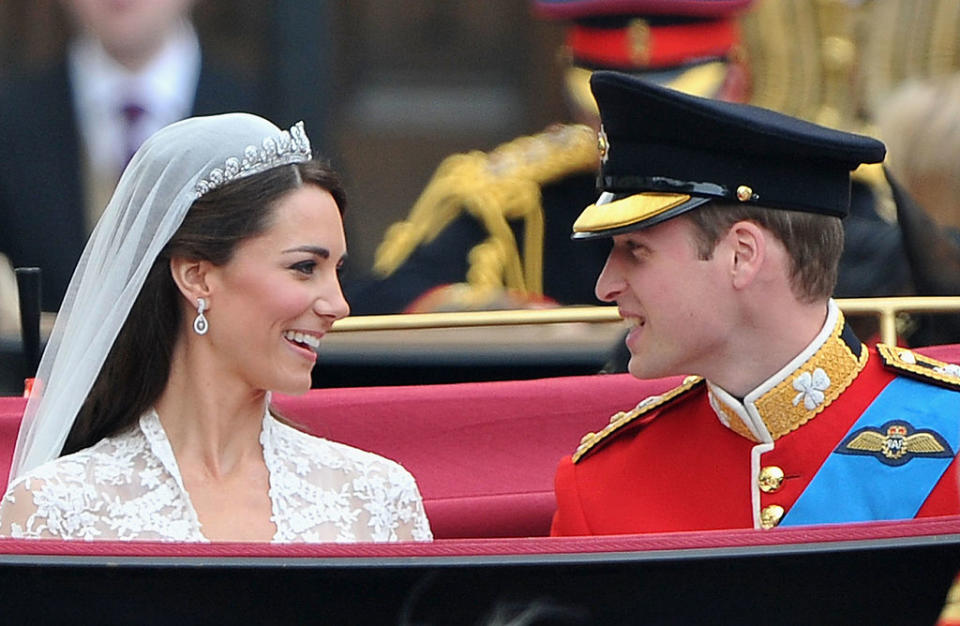 kate middleton wears cartier tiara, LONDON, ENGLAND - APRIL 29:  Their Royal Highnesses Prince William, Duke of Cambridge and Catherine, Duchess of Cambridge prepare to begin their journey by carriage procession to Buckingham Palace following their marriage at Westminster Abbey on April 29, 2011 in London, England. The marriage of the second in line to the British throne was led by the Archbishop of Canterbury and was attended by 1900 guests, including foreign Royal family members and heads of state. Thousands of well-wishers from around the world have also flocked to London to witness the spectacle and pageantry of the Royal Wedding.  (Photo by Pascal Le Segretain/Getty Images)