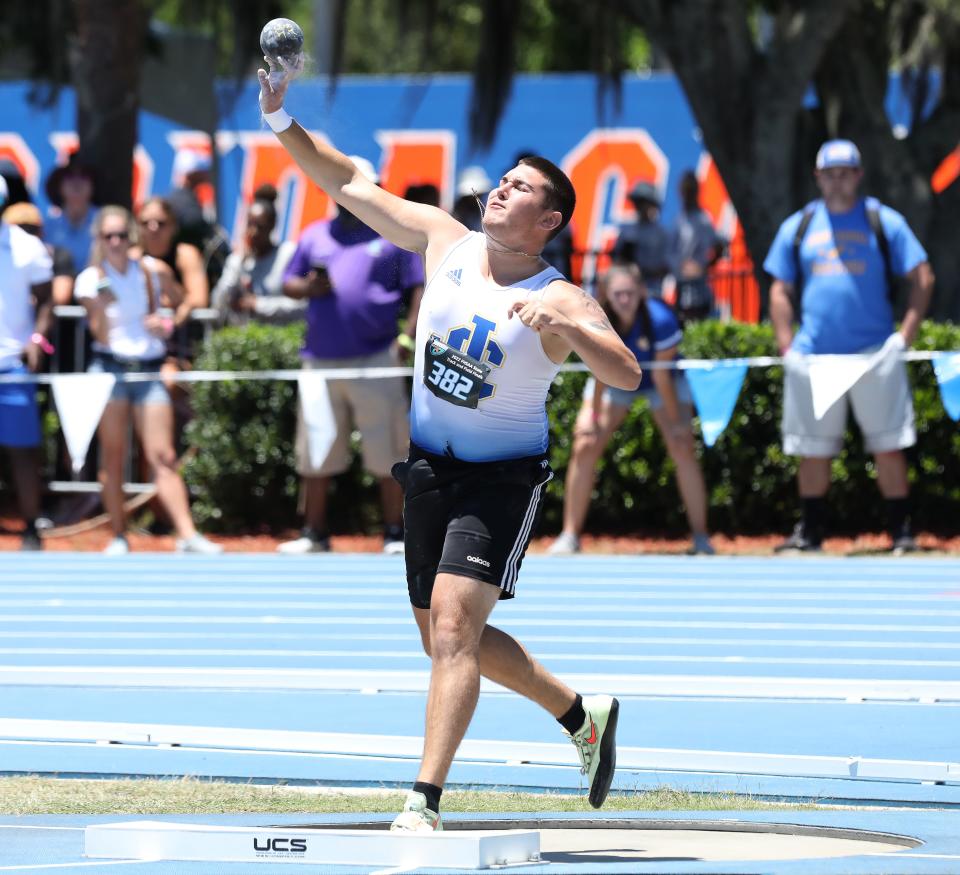 John Carroll Catholic High School's Cody Menke throws the shot put during the FHSAA Class 1A Track and Field State Championships, held at Percy Beard Track on the University of Florida campus, in Gainesville FL. May 11, 2022. Menke won the state championship with a throw of 16.11m.   [Brad McClenny/The Gainesville Sun]   