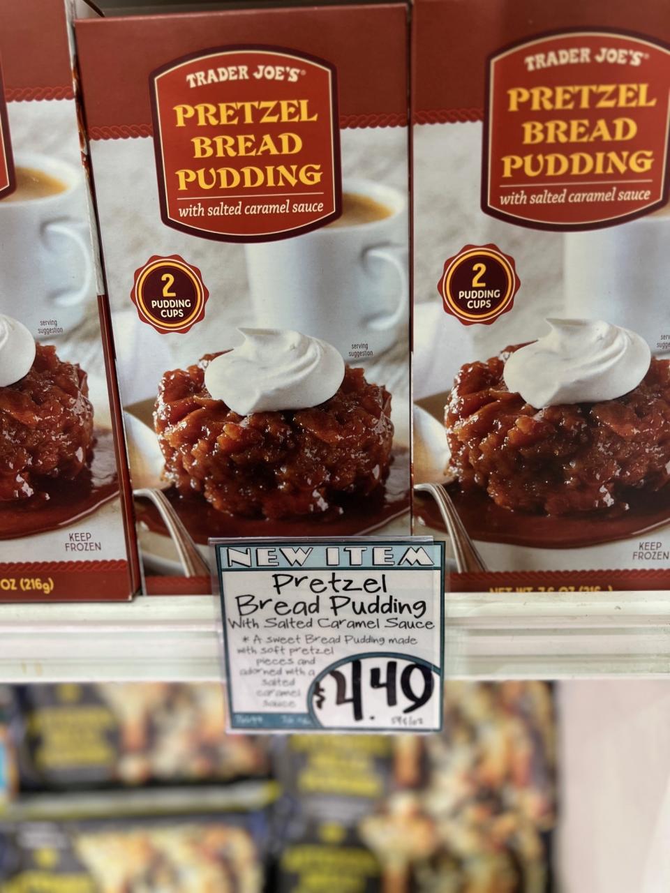 Boxes of Trader Joe's Pretzel Bread Pudding on the store shelf