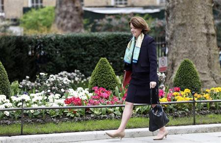 Britain's Minister for Culture, Media and Sport Maria Miller arrives for a cabinet meeting at 10 Downing Street in London March 18, 2014. REUTERS/Suzanne Plunkett