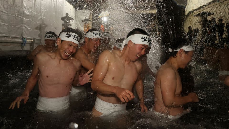 Participants purify themselves with cold water on Yamauchigawa river during Somin-sai festival at Kokusekiji Temple in Iwate prefecture, Japan on February 17, 2024. - The Asahi Shimbun/Getty Images