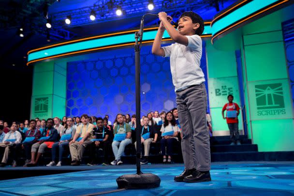 PHOTO: Six-year-old Akash Vukoti, of San Angelo, Texas, the youngest contestant in the 2016 National Spelling Bee, pulls down his microphone to compete in the preliminaries of the Bee at National Harbor, Md., May 25, 2016. (Jacquelyn Martin/AP, FILE)