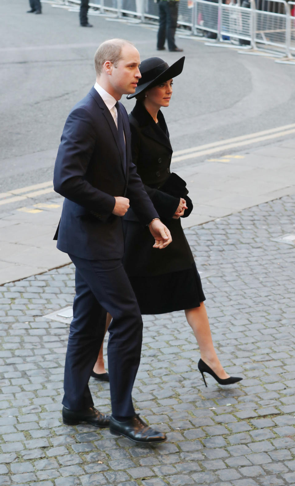 <p>Kate recycled a bespoke black Alexander McQueen coat for the Duke of Westminster’s memorial service. She first wore the velvet and wool ensemble in 2015 and on this occasion paired it with a wide-brimmed hat by Sylvia Fletcher. Suede Gianvito Rossi heels completed the look. </p><p><i>[Photo: PA]</i></p>