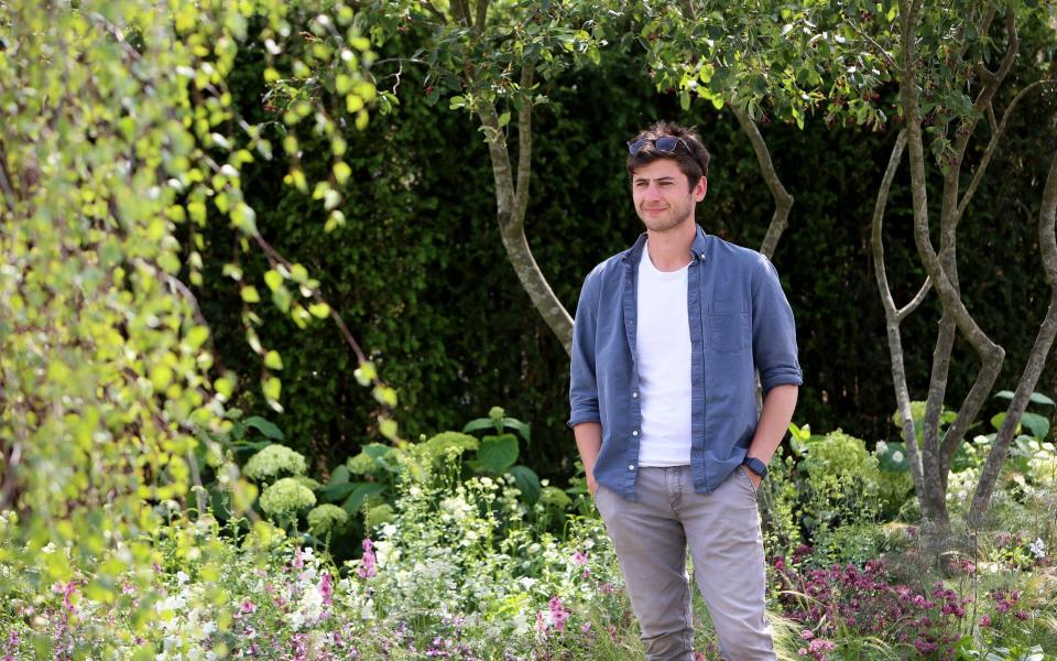 The Viking garden, designed by Will Williams (pictured), seen during the build up week of Hampton Court Flower Show - Clara Molden