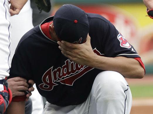 Indians pitcher Carlos Carrasco was hit by a line drive comebacker for the third time in four seasons. (AP)