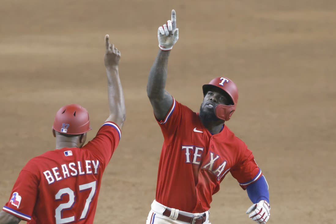 Adolis Garcia celebrates a walk-off HR