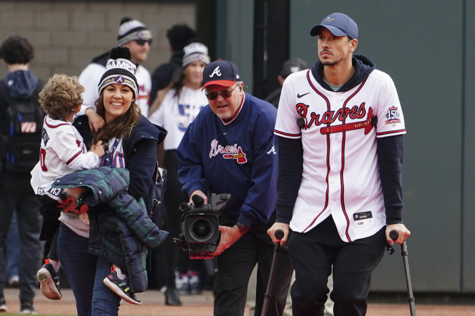 Atlanta Braves' Charlie Morton walks on the red carpet during a celebration at Truist Park, Friday, Nov. 5, 2021, in Atlanta. The Braves beat the Houston Astros 7-0 in Game 6 on Tuesday to win their first World Series MLB baseball title in 26 years. (AP Photo/John Bazemore)