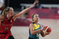 Australia's Leilani Mitchell (5) drives to the basket ahead of Belgium's Julie Allemand (55) during a women's basketball preliminary round game at the 2020 Summer Olympics, Tuesday, July 27, 2021, in Saitama, Japan. (AP Photo/Charlie Neibergall)