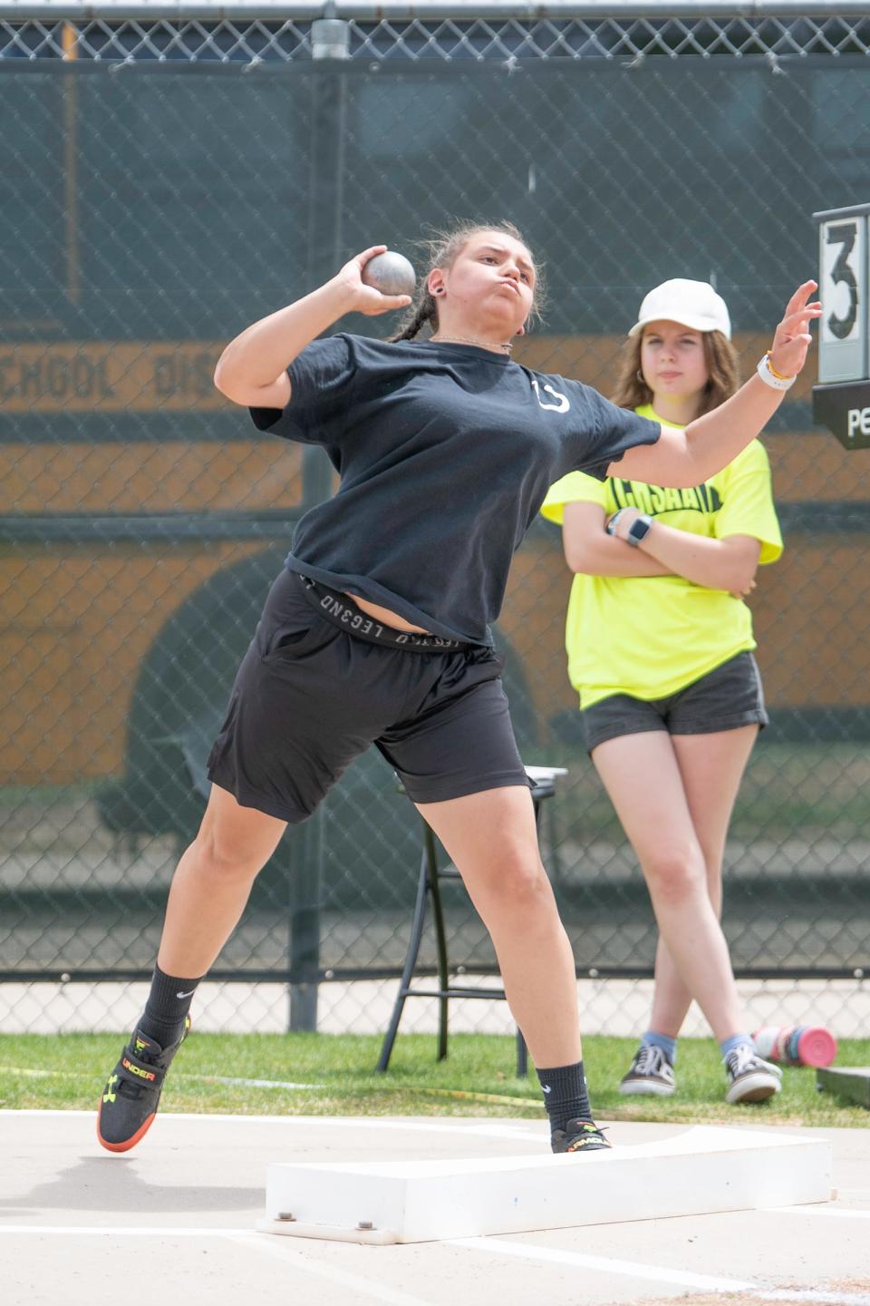 Pueblo South's Sarah Gurule launches a shot put during the Class 4A state track and field meet at Jeffco Stadium on Thursday, May 19, 2022.