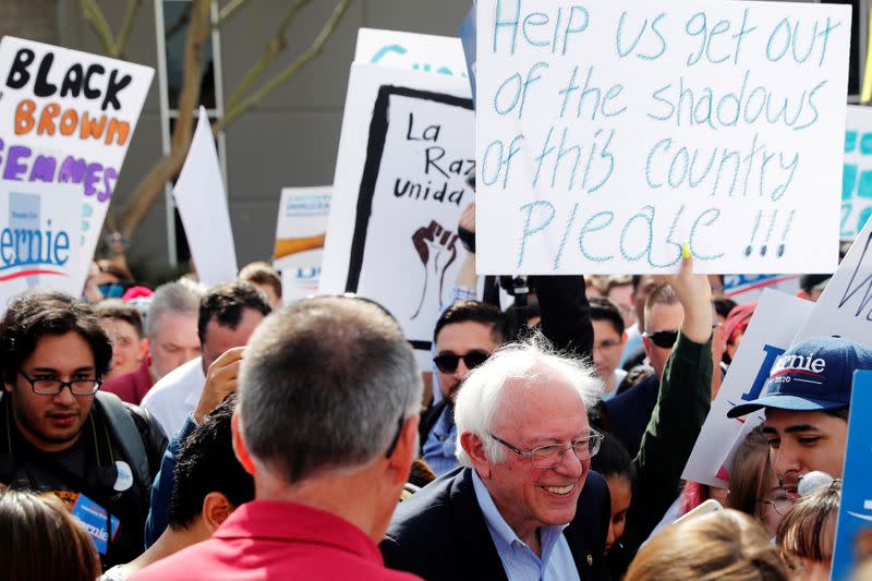 Democratic U.S. presidential candidate Senator Bernie Sanders walks with supporters during a 'Get Out the Early Vote March to the Polls' in Las Vegas, Nevada