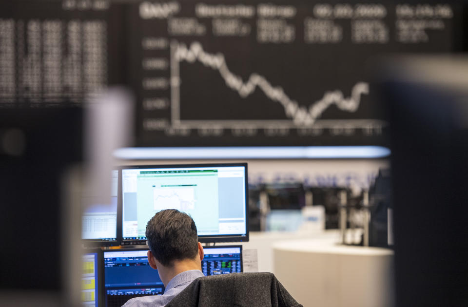 FRANKFURT AM MAIN, GERMANY - MARCH 02: A trader sits in desk pods on the trading floor of the Frankfurt Stock Exchange of the Deutsche Boerse AG on March 2, 2020 in Frankfurt, Germany. Europe is braced for more fallout from the coronavirus as confirmed cases of Covid-19, the disease caused by the coronavirus, have reached at least 117 in Germany and are expected to continue rising.  (Photo by Thomas Lohnes/Getty Images)